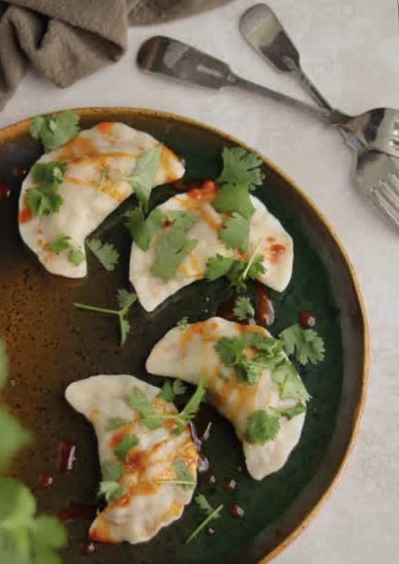 Pierogi meksykańskie z palonym masłem paprykowym